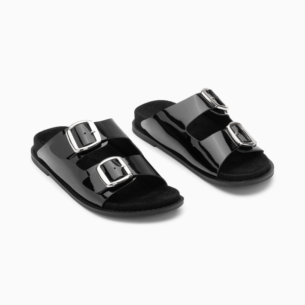 Vanessa Wu Mules Plates Célia Noir Verni à Boucles Oversize